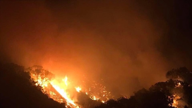 Images of the bushfire burning in the Great Sandy National Park near Teewah Camp Ground.