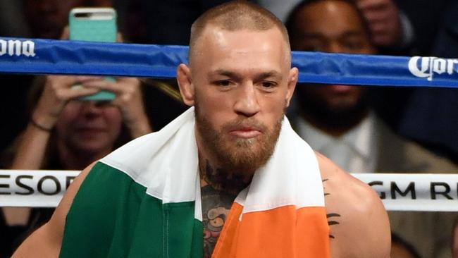Conor McGregor enters the ring to fight Floyd Mayweather.
