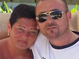 Husband and wife Frank and Lepa Alesi on holiday in Queensland. They are charged with 1000 fraud realted counts each after allegedly scamming nearly $1 million into their fake investment scheme.