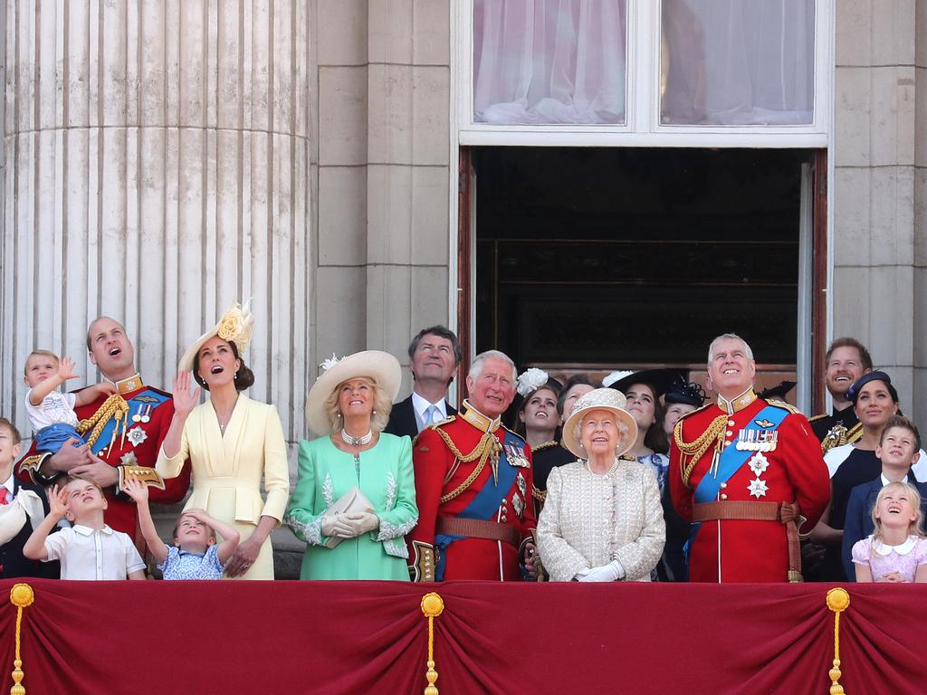 Meghan, stuck in the corner, may be wondering what everyone is looking at. Picture: Getty