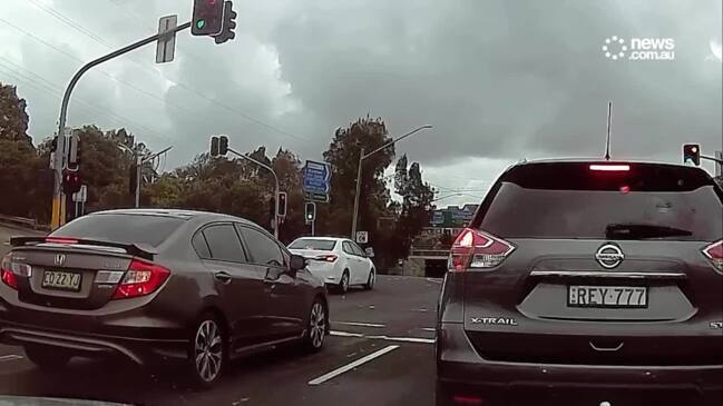 Cyclist sent flying after riding through red