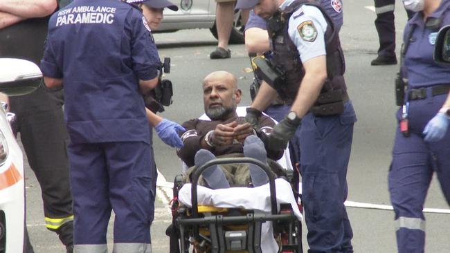 The man was arrested by tactical police before he was assessed by paramedics. Picture: TNV.