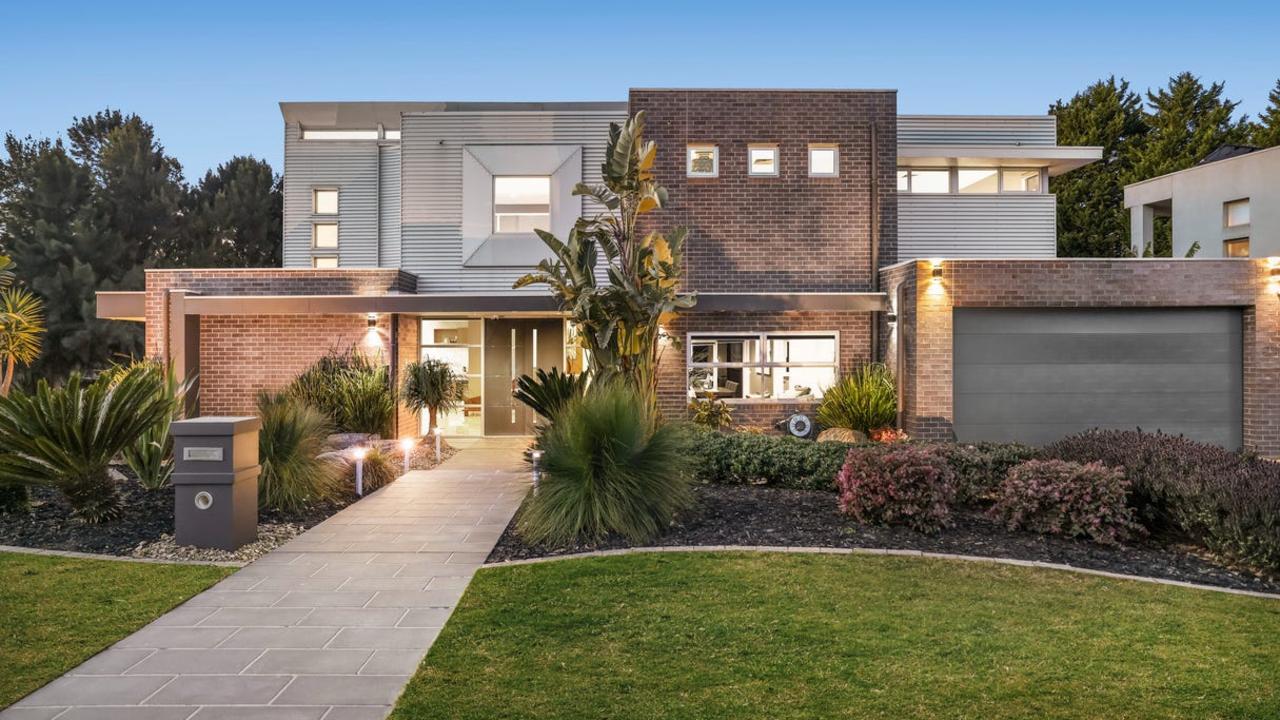 15 Gallery Place, Wheelers Hill, recently sold for $2.45m, but could surge to $2,482,585 after the next rate cut if historic trends repeat.