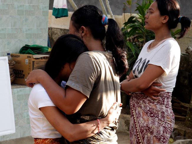 Family of Ni Ketut Lastri cry as her body arrives home. Picture: Lukman S Bintoro/ News Corp