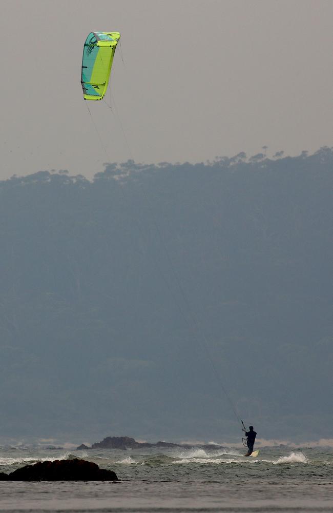 Kite surfers enjoy some wind and waves near Batemans Bay. Picture: Toby Zerna