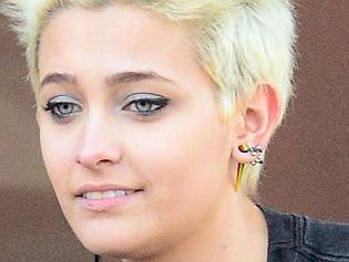 Paris Jackson shows what a futre Billionaire does in her spare time as she grabs a Sprinkles Cupcake with her bodyguard and a...