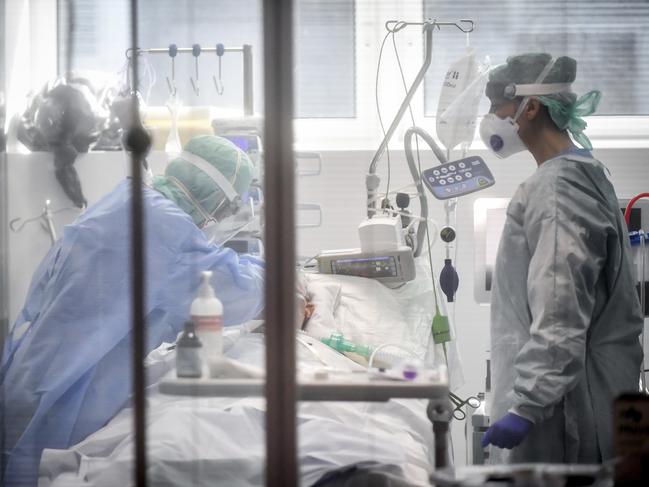 Medical personnel at work in the intensive care unit of the hospital of Brescia, Italy. Italy has become the country with the most coronavirus-related deaths. Picture: AP