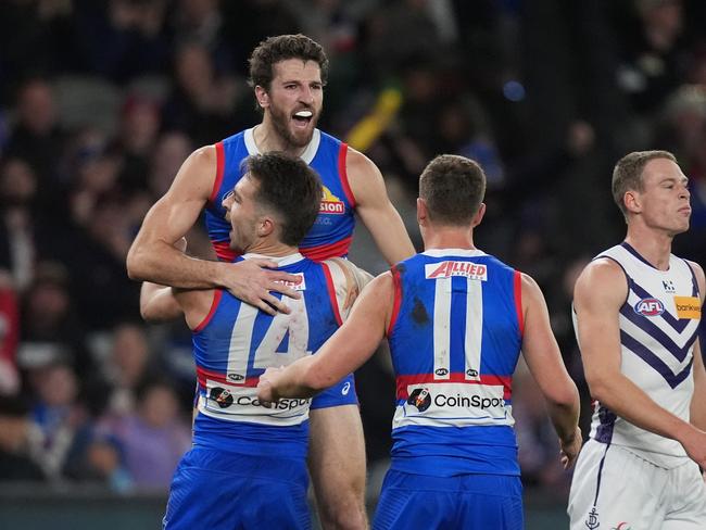 MELBOURNE, AUSTRALIA - JUNE 15: Marcus Bontempelli of the Bulldogs celebrates kicking a goal during the round 14 AFL match between Western Bulldogs and Fremantle Dockers at Marvel Stadium, on June 15, 2024, in Melbourne, Australia. (Photo by Daniel Pockett/Getty Images)