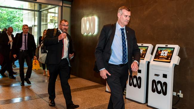 AFP officers arrive at the broadcaster’s Ultimo headquarters. Picture: Brendan Esposito/ABC