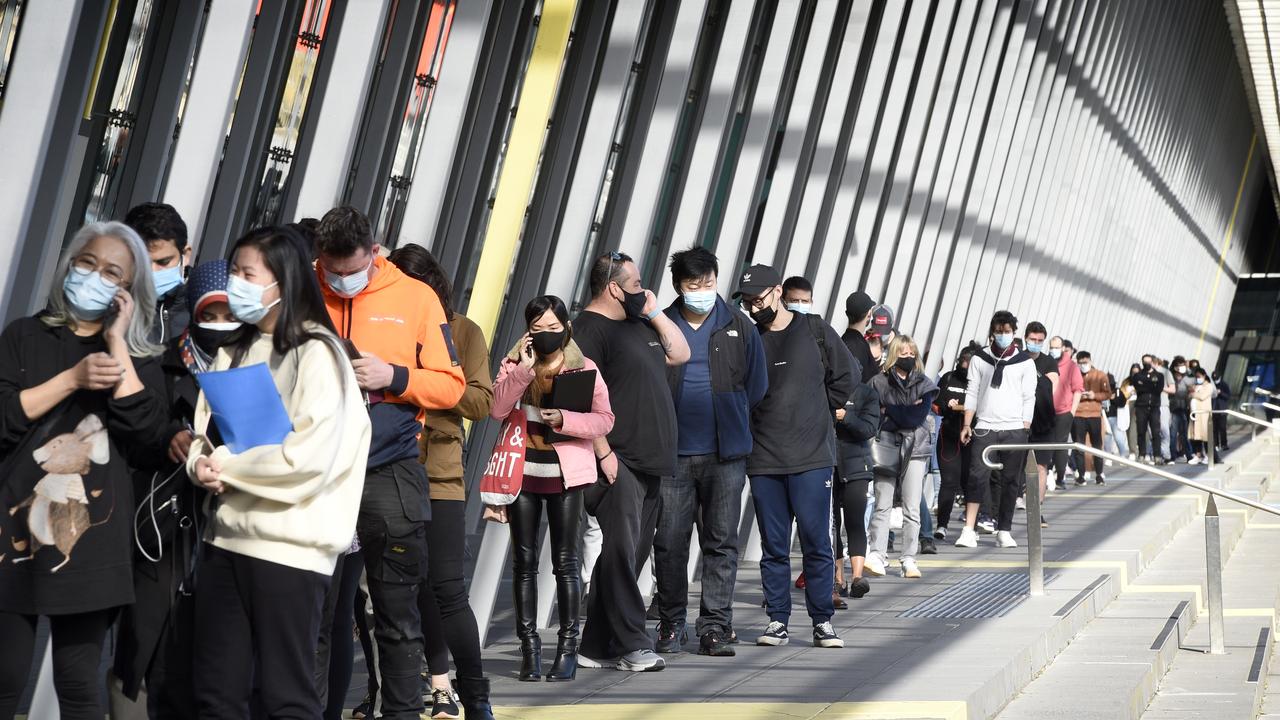 Victorians queue at a Covid vaccination centre at the Melbourne Convention and Exhibition Centre. Picture: NCA NewsWire / Andrew Henshaw