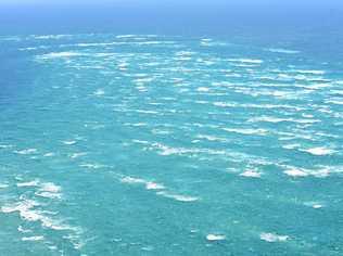 RESCUE REFORM: The notorious Wide Bay Bar, between Inskip Point and Fraser Island, has been the scene of many Coast Guard rescues, escorts and emergency assistance missions. Picture: Arthur Gorrie