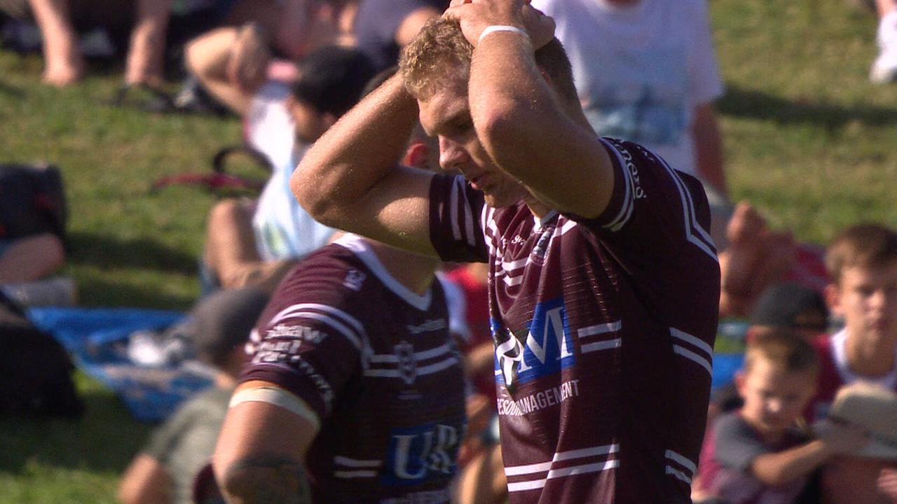 A dejected Tom Trbojevic leaves the field with a hamstring injury.