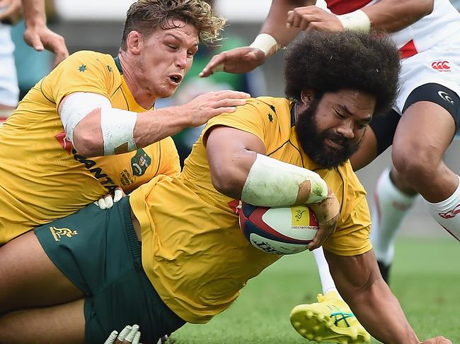 YOKOHAMA, JAPAN - NOVEMBER 04:  Tatafu Polota-Nau of the Wallabies scores a try during the international match between Japan and Australia at Nissan Stadium on November 4, 2017 in Yokohama, Kanagawa, Japan.  (Photo by Matt Roberts/Getty Images)
