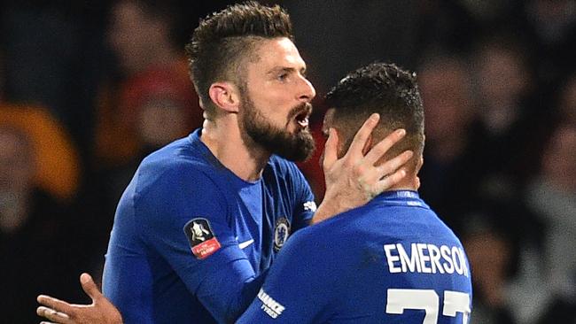 Olivier Giroud (L) celebrates his first Chelsea goal with Emerson Palmieri.