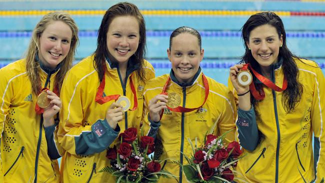 Australian swimmers (l-r) Bronte Barratt, Kylie Palmer, Linda Mackenzie and Stephanie Rice celebrate with their gold medals after they won the 4x200m freestyle relay final in Beijing.