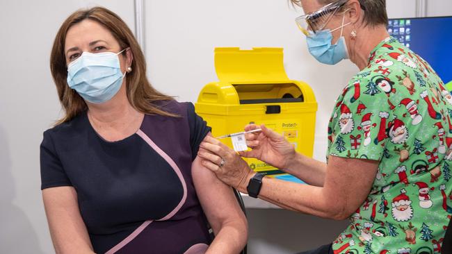 Premier Annastacia Palaszczuk receiving her Covid-19 booster jab from registered nurse Liz Smith at the Southbank vaccination hub. Picture: Brad Fleet