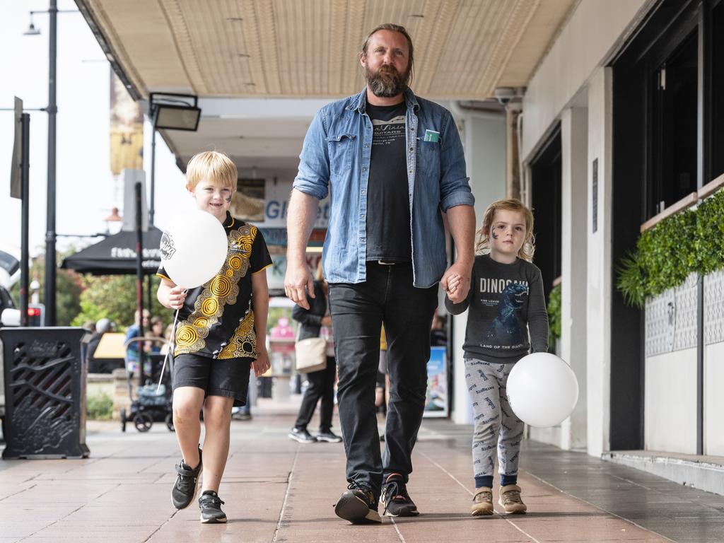 William Schaetzl with children William and Darcy Ray-Schaetzl enjoy the Toowoomba Busking Festival, Saturday, April 29, 2023. Picture: Kevin Farmer