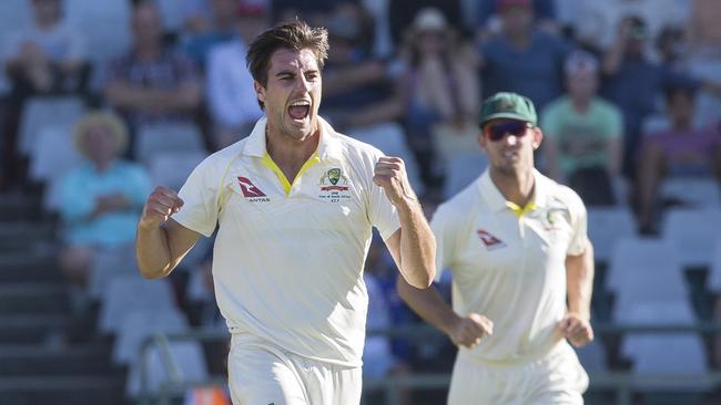 Pat Cummins of Australia celebrates taking the wicket of Temba Bavuma of South Africa and his third wicket of the day during a Test Match between South Africa and Australia at Newlands Stadium, in Cape Town, South Africa, Thursday, March 22, 2018. (AP Photo/Halden Krog)