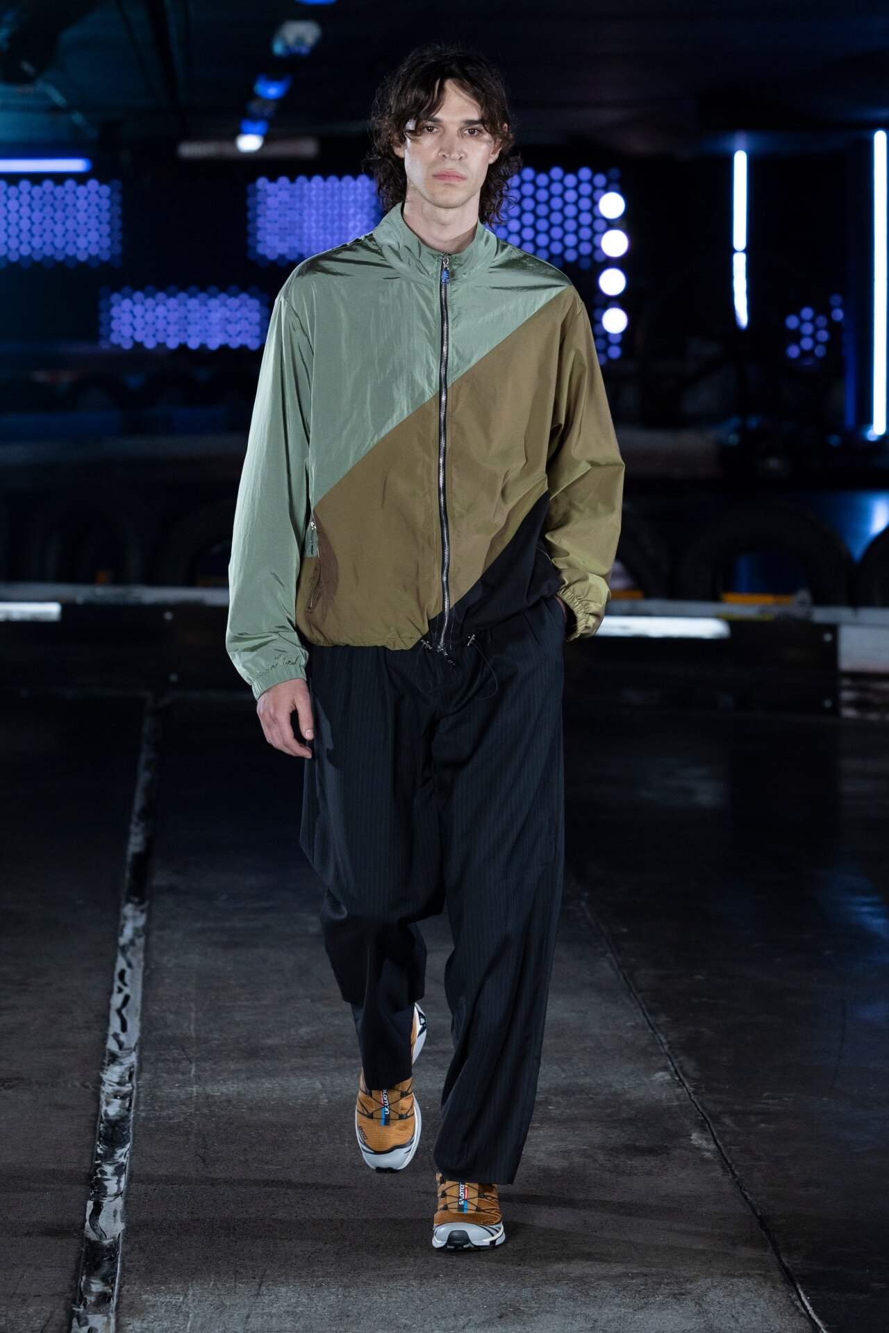 <p>The underground ’90s rave-aesthetic revival, while it might seem contradictory to see it now so popular out in the open, embodies this edgier take on streetwear that is slowly becoming one with higher fashion. Gowns with cropped blousons, moto jackets with tailored pants—whether seen on the <a href="https://www.vogue.com.au/fashion/news/sydney-fashion-week-street-style-2023/image-gallery/8bf24ebdc767b693968c29ea9b584d04" target="_blank" rel="noopener">street style set</a>, or the runway, the ubiquity of these styles of jackets are showing no sign of slowing down.</p><p>Maybe too, it’s their all-encompassing silhouette, which lends them a handy genderless edge that is lending to their staying presence at shows. Styled between menswear and womenswear with ease.</p><p>Internationally, designers like Martine Rose have made track jackets an integral part of collections, a nod to the designer’s roots in electronic music, sport, as well as ’80s and ’90s counterculture. Here however, these jackets are ideal for the hard-to-prepare for interseasonal weather, of which that period of the year is constantly in flux.</p><p>Taking a leaf from the AAFW designers’ books; whether your jacket is for the club or a day out, it is always better to be prepared.</p><p><a href="https://www.newsletters.news.com.au/vogue" target="_blank" rel="noopener"><i>Sign up to the Vogue newsletter</i></a></p><p><strong>See more coverage from AAFW 2023 below:</strong></p><p><a href="https://www.vogue.com.au/fashion/news/sydney-fashion-week-street-style-2023/image-gallery/8bf24ebdc767b693968c29ea9b584d04" target="_blank" rel="noopener" data-saferedirecturl="https://www.google.com/url?q=https://www.vogue.com.au/fashion/news/sydney-fashion-week-street-style-2023/image-gallery/8bf24ebdc767b693968c29ea9b584d04&amp;source=gmail&amp;ust=1684280675283000&amp;usg=AOvVaw2vdvPKsuoDKj20wnzPOY-b">All the street style from day 1 of Australian Fashion Week</a></p><p><a href="https://www.gq.com.au/style/street-style/australia-fashion-week-street-style/image-gallery/df327b09a208bb624d345b3968b524cc" target="_blank" rel="noopener" data-saferedirecturl="https://www.google.com/url?q=https://www.gq.com.au/style/street-style/australia-fashion-week-street-style/image-gallery/df327b09a208bb624d345b3968b524cc&amp;source=gmail&amp;ust=1684280675283000&amp;usg=AOvVaw2yl_gVMT5jjb5hwQOYzZYZ">The best dressed men at Australian Fashion Week</a></p><p><a href="https://www.vogue.com.au/fashion/fashion-shows/australian/bondi-born-resort-2024/image-gallery/df04055dd9f5e4524bb29e666196ffa7" target="_blank" rel="noopener" data-saferedirecturl="https://www.google.com/url?q=https://www.vogue.com.au/fashion/fashion-shows/australian/bondi-born-resort-2024/image-gallery/df04055dd9f5e4524bb29e666196ffa7&amp;source=gmail&amp;ust=1684280675283000&amp;usg=AOvVaw3LOnbGyFENzrLj3OgmnCkI">Inside Bondi Born's Resort 2024 runway show</a></p><p><a href="https://www.vogue.com.au/fashion/trends/australia-fashion-week-street-style-trends/image-gallery/eae40475737bbf4035616b925ef497db" target="_blank" rel="noopener" data-saferedirecturl="https://www.google.com/url?q=https://www.vogue.com.au/fashion/trends/australia-fashion-week-street-style-trends/image-gallery/eae40475737bbf4035616b925ef497db&amp;source=gmail&amp;ust=1684280675283000&amp;usg=AOvVaw0rbbbvSVrmFyNRR5PSUGwJ">All the street style trends spotted at Australian Fashion Week 2023</a></p><p><a href="https://www.vogue.com.au/shopping/vogue-fashion-week-street-style-2023/image-gallery/a148af7e06c9d36550fa1acd420988fb" target="_blank" rel="noopener" data-saferedirecturl="https://www.google.com/url?q=https://www.vogue.com.au/shopping/vogue-fashion-week-street-style-2023/image-gallery/a148af7e06c9d36550fa1acd420988fb&amp;source=gmail&amp;ust=1684280675283000&amp;usg=AOvVaw2cfvDcyqxOOQXuklZfn8qV">What the Vogue team wore to fashion week 2023</a></p>