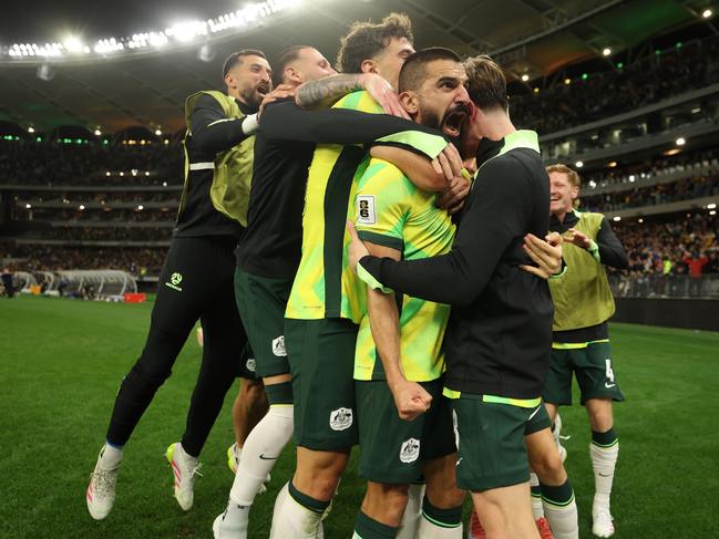 Aziz Behich and the Socceroos celebrate. Picture: Getty Images