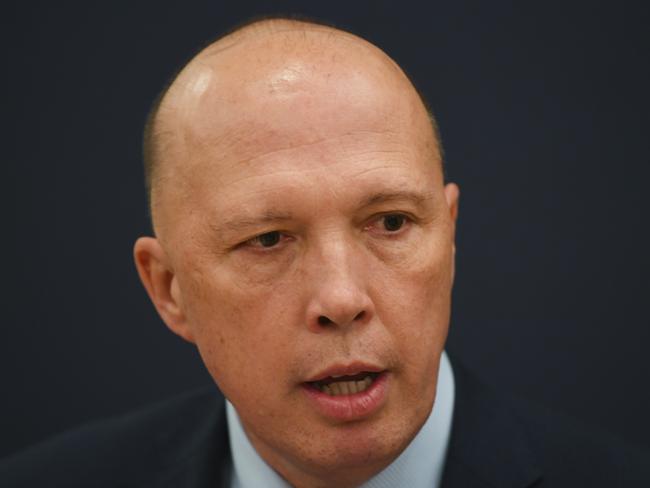 Home Affairs Minister Peter Dutton speaks during a meeting of an Industry Advisory Panel on Australia's 2020 Cyber Security Strategy at Parliament House in Canberra, Monday, November 25, 2019. (AAP Image/Lukas Coch) NO ARCHIVING