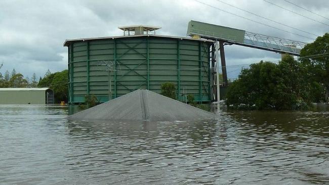 East Bundaberg Mill in flood water, 2013. An industrial site overtaken by excessive floodwater. Photo: Denise Goode