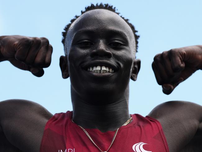 BRISBANE, AUSTRALIA - DECEMBER 06: Gout Gout of Queensland poses after winning his Boys' U18 100m heat in 10.04 seconds with a +3.4 tail-wind during the 2024 Chemist Warehouse Australian All Schools Athletics Championship at Queensland Sport and Athletics Centre on December 06, 2024 in Brisbane, Australia. (Photo by Cameron Spencer/Getty Images)