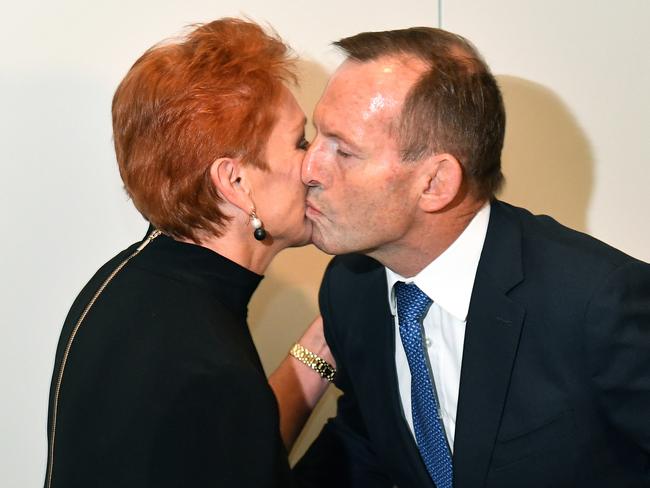 The poster campaign uses a similar image of Mr Abbott with Senator Pauline Hanson. Picture: AAP Image/Mick Tsikas