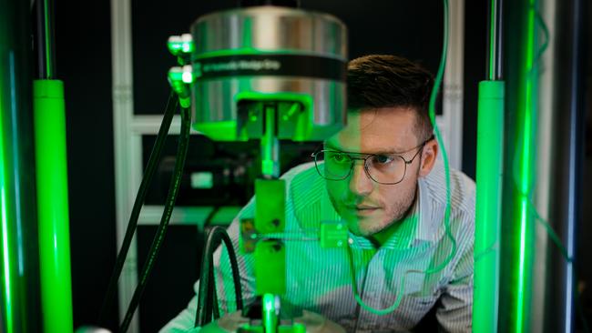 A researcher from Future Fuels CRC conducts hydrogen research at the University of Wollongong for APA Group. Picture: Wesley Lonergan.