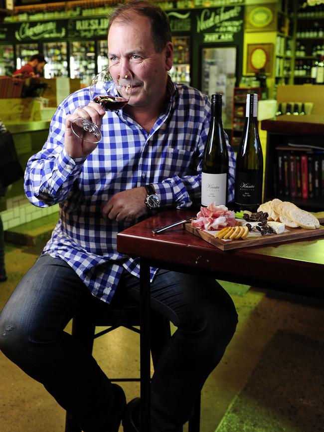 Georgina the wine and cheese platters at East End Cellars. Michael Andrewartha is pictured enjoying a red. Picture: Mark Brake