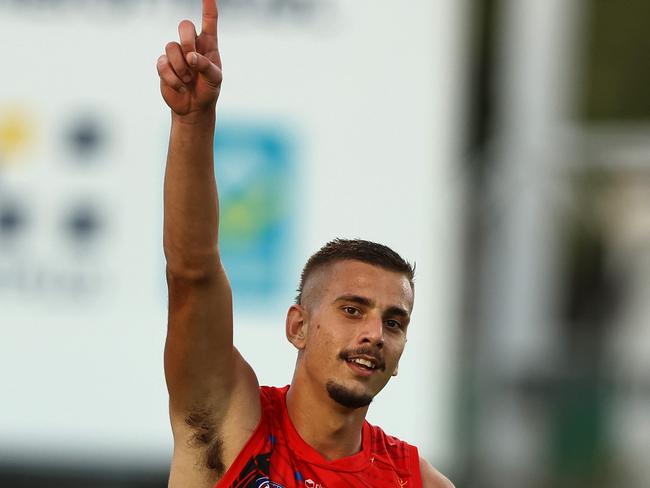 Territory product Joel Jeffrey celebrates after scoring a goal against North Melbourne Kangaroos at TIO Stadium in June. Picture: Robert Cianflone/Getty Images.