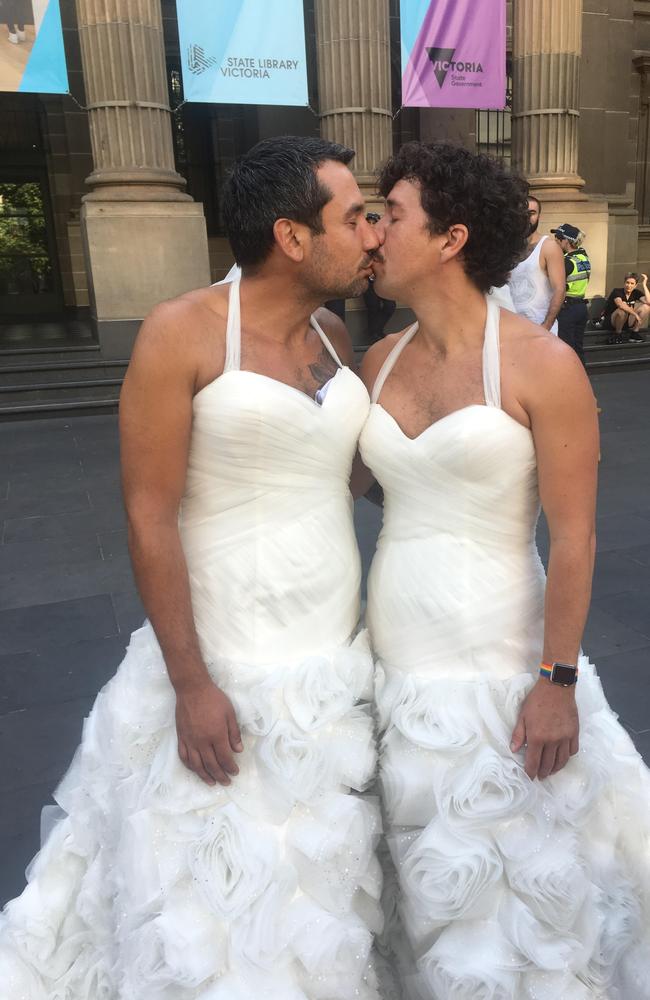 Melbourne: Dressed in wedding dresses, partners Luke Meehan, 33, and George Papagiammopoulous, 35 outside the State Library in Melbourne. SSM. Picture: Supplied