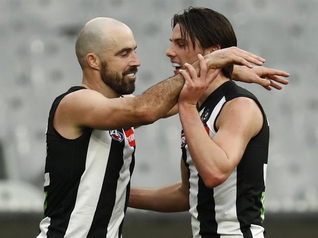 Steele Sidebottom (L) captained Collingwood on Saturday in the absence of Scott Pendlebury. (Photo by Darrian Traynor/Getty Images)