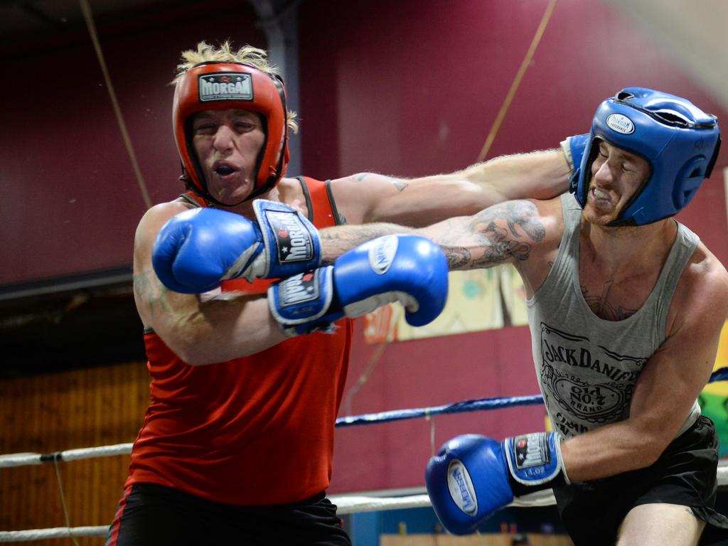 81kg fighters Shane Allan (PCYC) and Torin O'Brien (Rhino) trade blows on Saturday night.Photo Allan Reinikka / The Morning Bulletin