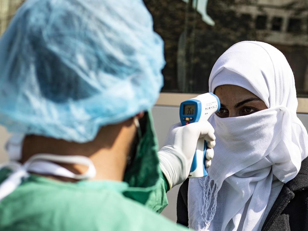 Temperature tests don’t stop the spread of the virus as people could already be infected but have no symptoms. Picture: Delil Souleiman/AFP