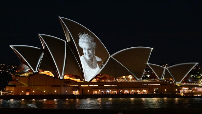 Sydney Opera House lit up with the picture of Queen Elizabeth II to commemorate her life on September 9, 2022. Picture: Muhammad FAROOQ / AFP