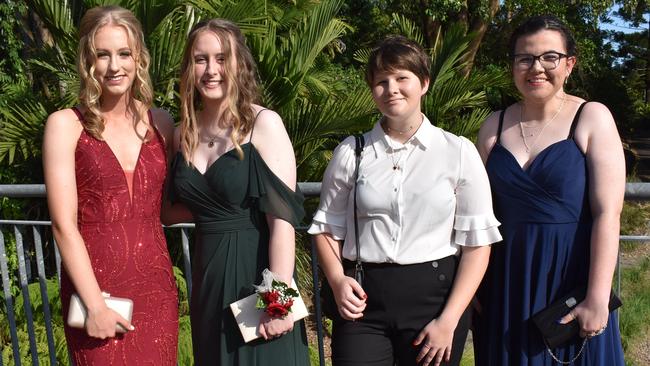 Ella Anderson, Erin Westcott, Lee Hore and Chelsea Bycroft ready the Mackay State High School 2021 Year 12 formal, November 16, 2021. Photo: Tara Miko and Janessa Ekert