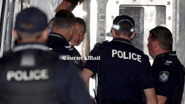 An asylum seeker is pictured in police custody in far north Queensland. Picture: Marc McCormack