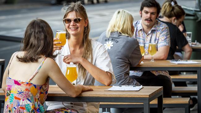 Melburnians enjoying a drink at BeerMash on Smith Street. Picture: Jake Nowakowski