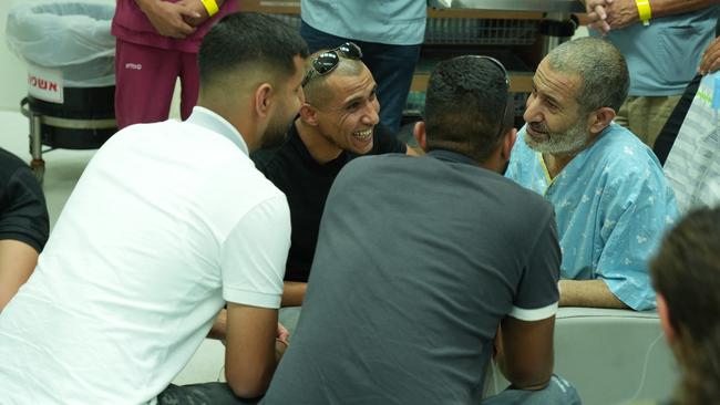 Qaid Farhan Al-Qadi talks to relatives and friends after arriving for a checkup at the Soroka Medical Centre in Beersheva. Picture: AFP