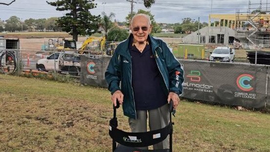 Eric Tweedale inspects the work at Granville Park, Merrylands.