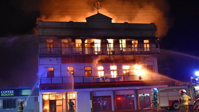 Crews battle the fierce blaze at the Spotted Dog and Federal Backpackers.