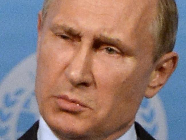 Russian President Vladimir Putin gestures as he speaks at a press conference after the Shanghai Cooperation Organization (SCO) summit in Ufa on July 10, 2015. AFP PHOTO / ALEXANDER NEMENOV