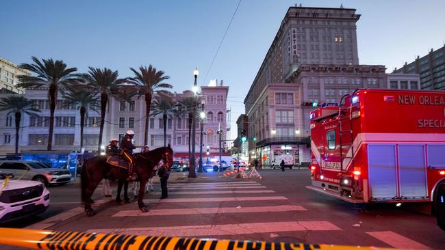 Police cordon off the intersection of Canal Street and Bourbon Street in the French Quarter of New Orleans. Picture: Matthew Hinton/AFP