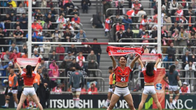 Cheerleaders for the Sunwolves perform ahead of the start of the Super Rugby match.