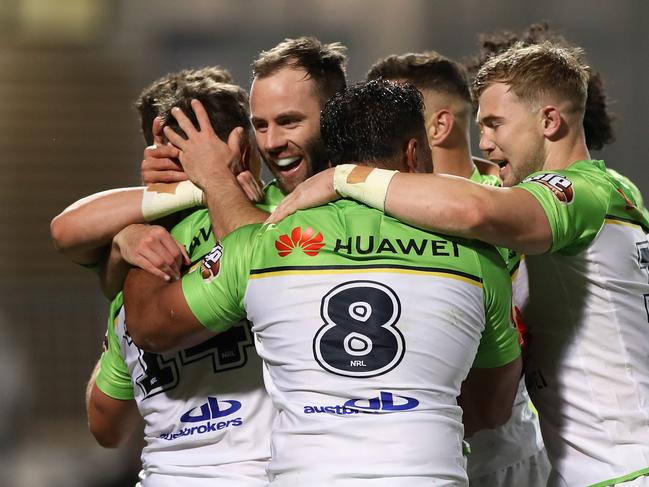 SYDNEY, AUSTRALIA - SEPTEMBER 26:  Kai O'Donnell of the Raiders celebrates with team mates after scoring a try during the round 20 NRL match between the Cronulla Sharks and the Canberra Raiders at Netstrata Jubilee Stadium on September 26, 2020 in Sydney, Australia. (Photo by Mark Kolbe/Getty Images)