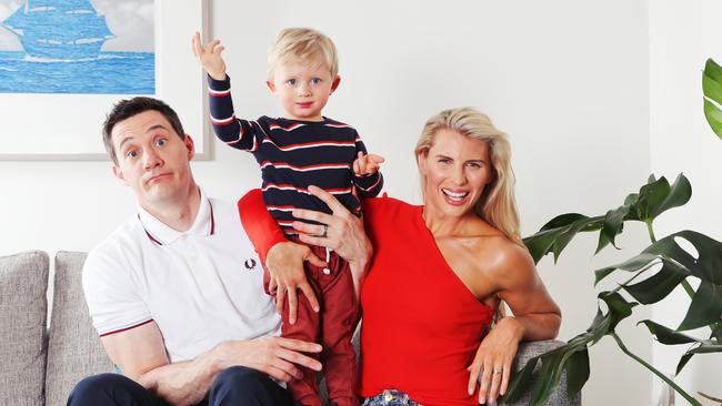 Ed Kavalee, Tiffiny Hall and son Arnold at home. Picture: Rebecca Michael