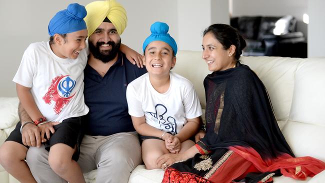 Harminder Singh and wife Parminder with their children Prabhveer and Japveer who will benefit from the Sikh School which is to be built in Rouse Hill. Photo Jeremy Piper