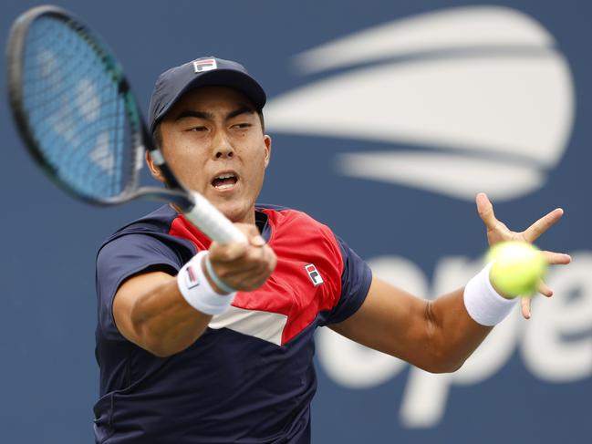 Rinky Hijikata returns a ball in his first-round US Open win against Pavel Kotov. Picture: Sarah Stier/Getty Images