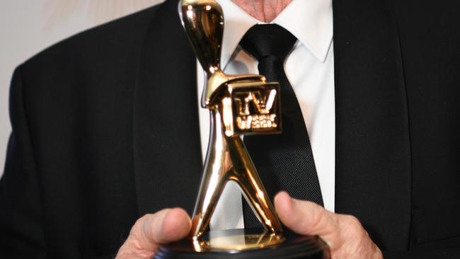 Veteran journalist Kerry O'Brien poses with a Logie award after he was inducted into the Logies Hall of Fame during the 2019 Logie Awards at The Star Casino on the Gold Coast, Sunday, June 30, 2019. (AAP Image/Dan Peled) NO ARCHIVING, EDITORIAL USE ONLY